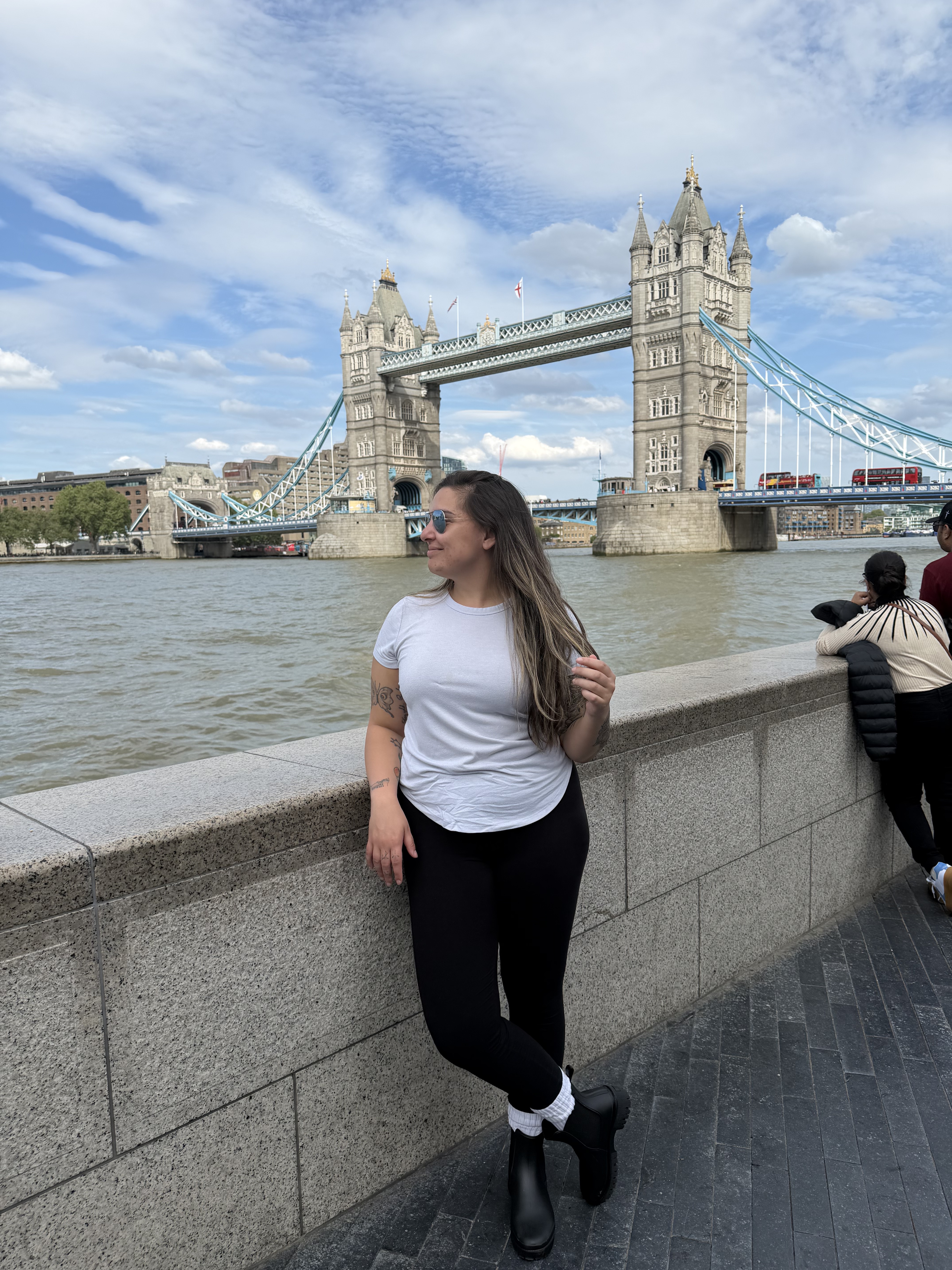 Morgan standing in front of London Tower Bridge