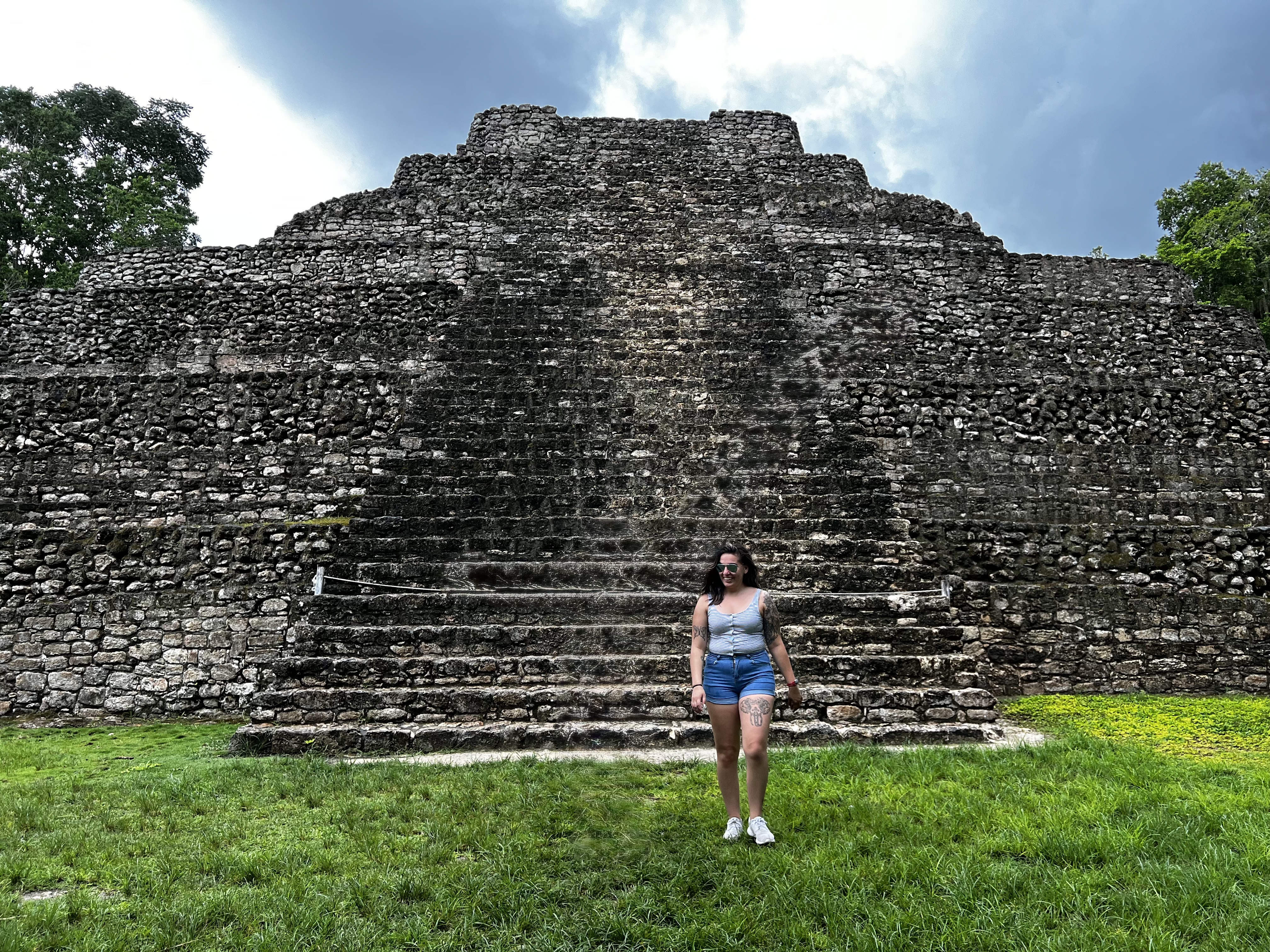 Ancient Mayan ruins rising above the jungle canopy
