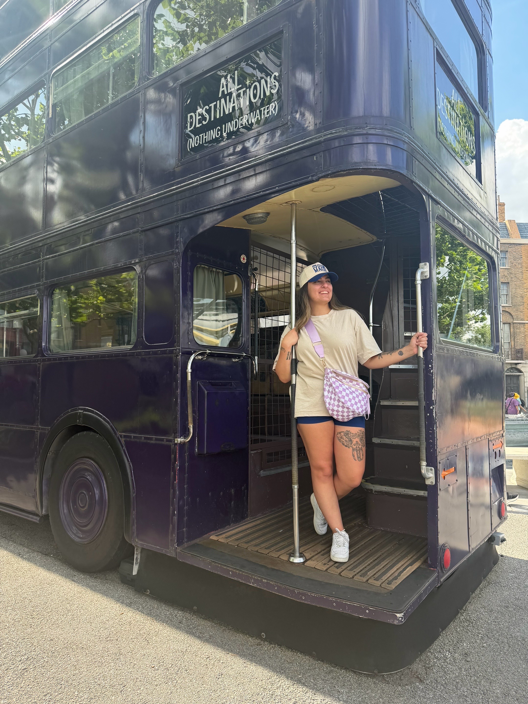 The iconic purple Harry Potter Knight Bus on a London street